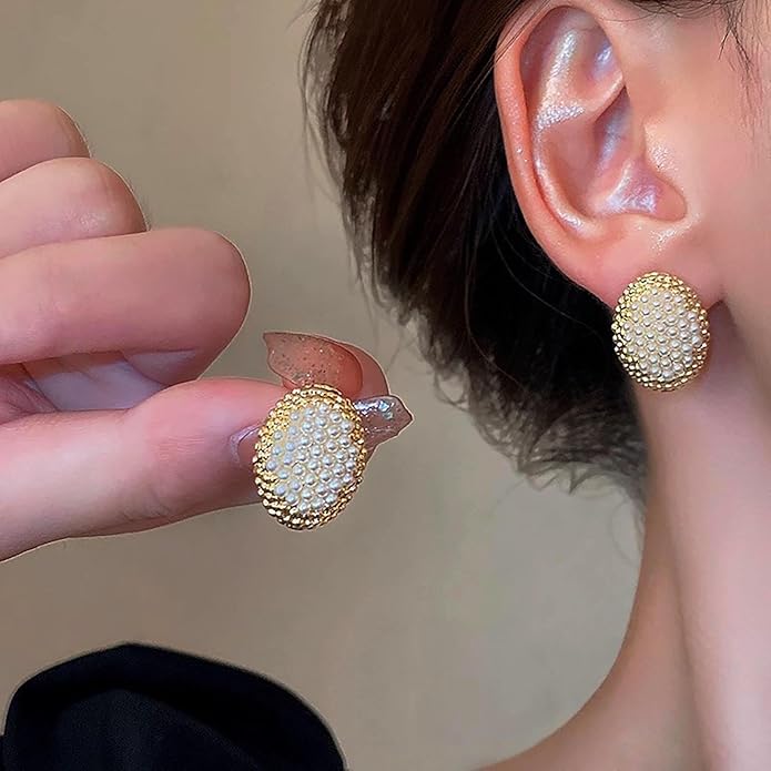 Gold and white stud earrings